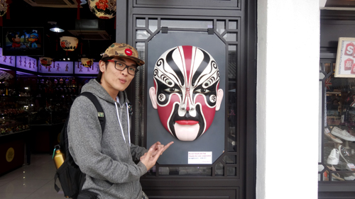 HKBushcraft standing in front of a mask store in Ngong Ping Village